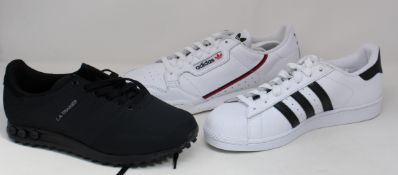 Three pairs of as new Adidas trainers; Superstar (UK 9.5), LA Trainer Weave (UK 8) and Continental