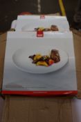 Nine as new Kuhn Rikon 30cm steak plate sets (Two plates per set).