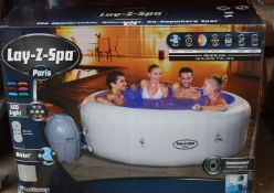 A boxed as new Bestway Lay-Z-Spa Paris.