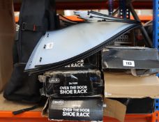 A Stanley Fatmax tool bag, seven boxes of as new shoe racks and a quantity of dog collar cones.