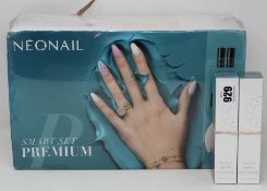 A Neonail Smart Set Premium (10/22) and two Becca Ignite Liquified Light Highlighters (45ml), all