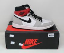 A pair of as new Nike Air Jordan 1 Retro High OG (UK 9.5).
