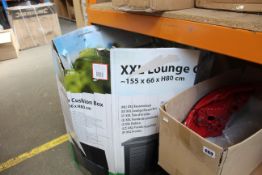 A box of pre-owned genuine car tail lights.