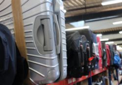 A quantity of empty suitcases/holdalls.