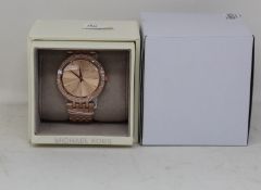 A ladies as new Michael Kors Darci watch in rose gold (MK3192).