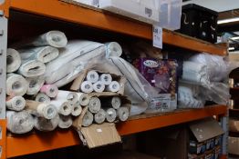 A quantity of household and related items to include wallpapers, mattress protectors and other