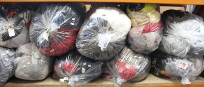 Ten bags of pre-owned clothing and related items.