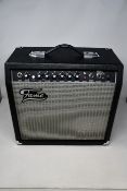 A boxed as new FAME GX-30G Combo Amplifier (Requires UK adaptor).