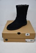A pair of as new Ugg Aveline boots (UK 7).
