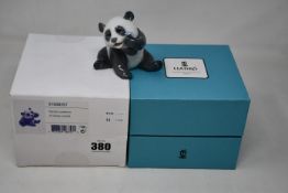 A boxed as new Lladro happy panda figurine (01008357).