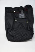 An as new Malle London backpack with dry bag cover.