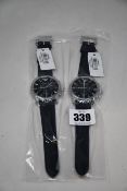 Two men's as new Emporio Armani AR0431 classic black watches (No boxes included).