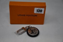 An as new Louis Vuitton cut circle key holder (RRP £195).