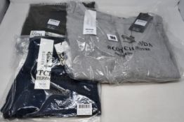 Three pairs of assorted as new Scotch & Soda trousers (Sizes W33/L30, W28/L32, W33/L32).