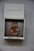 A ladies as new Michael Kors Darci watch in rose gold (MK3192).