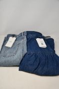 An as new Celine Paris Prairie denim skirt (Size 28 - RRP £390) and a pair of as new Celine Paris