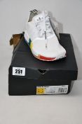A pair of as new Adidas NMD_R1 Pride trainers (UK 6).