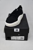 A pair of as new Adidas Y-3 Yuben Low trainers (UK 7.5).