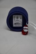 Three boxed as new Swarovski rocking Santa ornaments.
