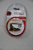Three as new G7th Performance 3 Guitar Capos for steel strings (Special Edition Celtic Engraved).