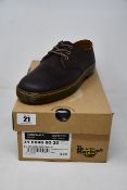 A pair of as new Dr Martens Cruise Coronado (UK 9).