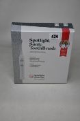 A boxed as new sealed Spotlight Sonic Toothbrush.