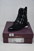A pair of as new Carvela Strap boots black biker style boot with micro stud detailing (EU 39).