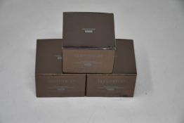 Eight Laura Mercier translucent loose setting powder (Glow) (8 x 29g).