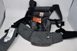 An as new Ergobaby Omni 360 cool air mesh baby carrier.