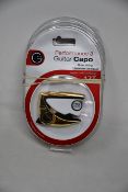 Three as new G7th Performance 3 Guitar Capos for steel strings (Special Edition Celtic Engraved).