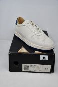 A pair of as new Clae Los Angeles Malone trainers (UK 8).