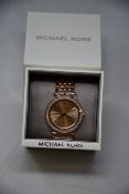 A ladies as new Michael Kors Darci watch in rose gold (MK3192).