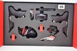 An as new SRAM Red AXS brake lever/gear shifter/derailleur upgrade kit for rim brakes (Road).