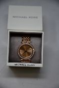 A ladies as new Michael Kors Darci watch in rose gold (MK3192).