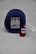 Two boxed as new Swarovski rocking Santa ornaments.