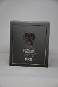 A boxed as new Pitbull Skull Shaver gold pro.