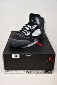 A pair of as new Nike Air Jordan 5 retro trainers (UK 12).