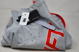 A pair of as new Shift 2021 Black Label King pants in grey/red (Size 32 - RRP £149).