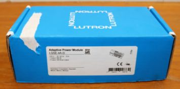 A boxed as new Lutron LQSE-4A-D Adaptive Power Module (Box opened, some superficial damage to box).