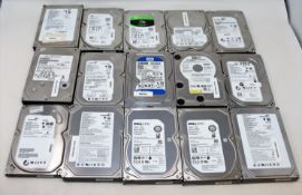 Sixteen assorted pre-owned hard disk drives (Various capacities. All wiped).