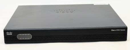 A boxed Cisco Integrated Services Router 4321 AX Bundle(Model: ISR4321-AX/K9 Z800-44681-05) (Appears