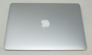 A pre-owned MacBook Air 13