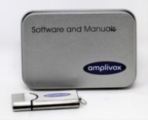 An as new Amplivox Audibase 5.5.101 Audiogram Database Software and Manuals USB Flash Drive in metal