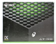 A pre-owned Microsoft Xbox Series X 1TB Game Console in Black (Model 1882) (Boxed. No controllers,