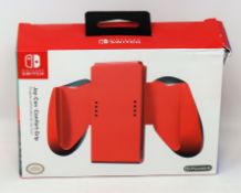 Four boxed as new PowerA Joy-Con Comfort Grip for Nintendo Switch in Red (Boxes sealed, some