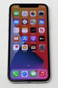 A pre-owned Apple iPhone X (AT&T/T-Mobile/Global/A1901) 64GB in Silver (iCloud activation clear) (