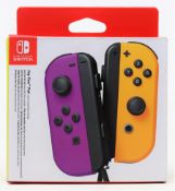 A boxed as new Nintendo Switch Joy-Con Controller Pair in Neon Purple/Neon Orange (P/N: HAC-JAQAA