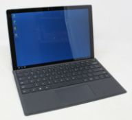A pre-owned Microsoft Surface Pro 4 in silver with Intel i5-6300U 2.4GHz processor, 8GB RAM, 256GB