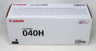 A boxed as new Canon 040 Black Toner Cartridge (P/N: 0461C002AA), a boxed as new Canon 040 Cyan