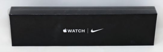 A boxed as new Apple Watch Nike SE (GPS + Cellular, 44mm) Silver Aluminium Case with Pure Platinum/